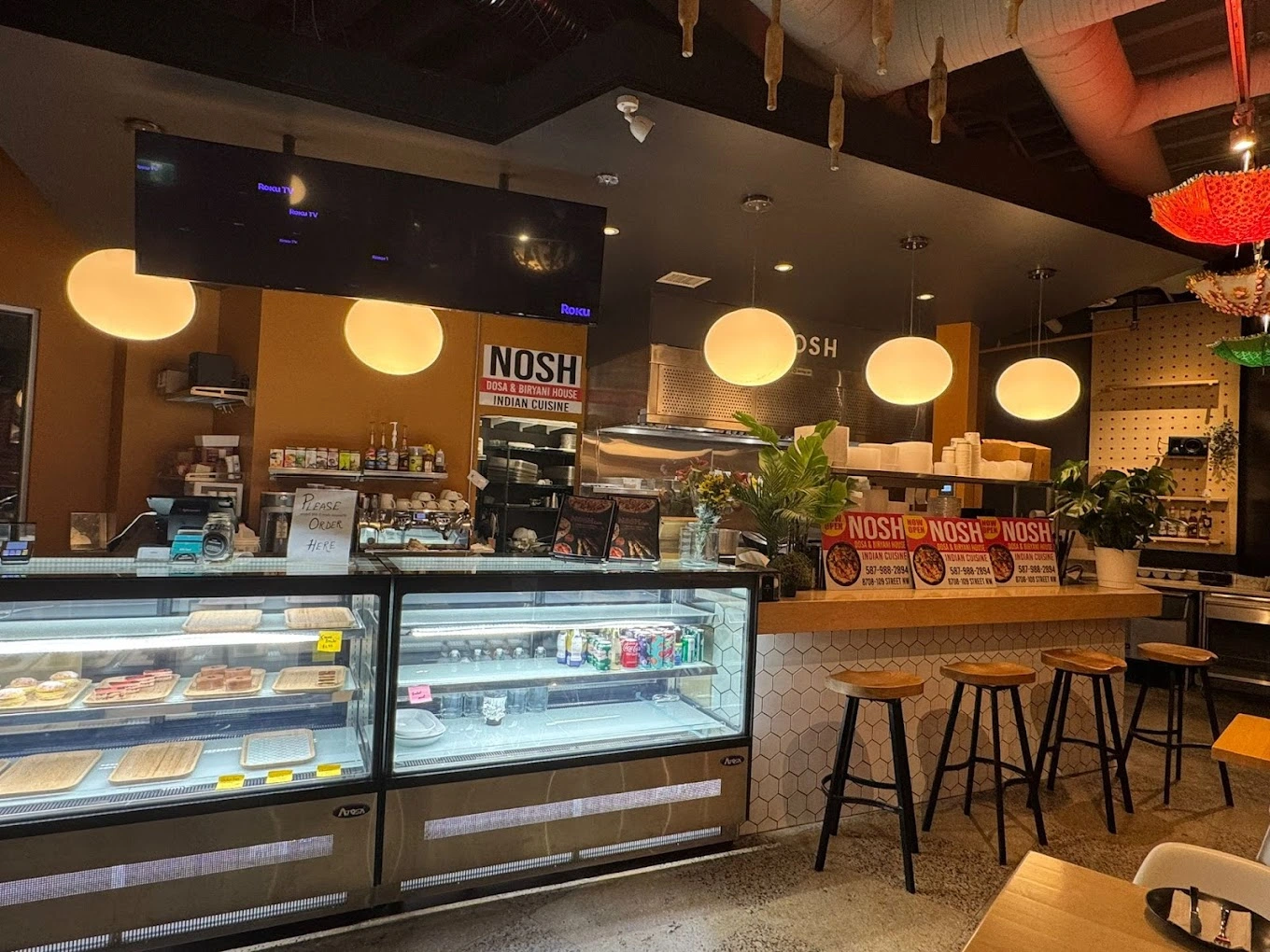 Nosh Cafe 109 Street - Authentic Indian restaurant near University of Alberta serving Indian and Indo-Chinese cuisine